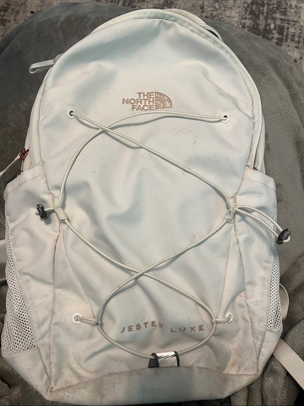 The North Face Jester Luxe Backpack in cream with rose gold details